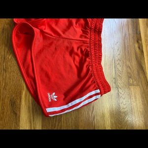 Bright red women’s adidas skate short, size M